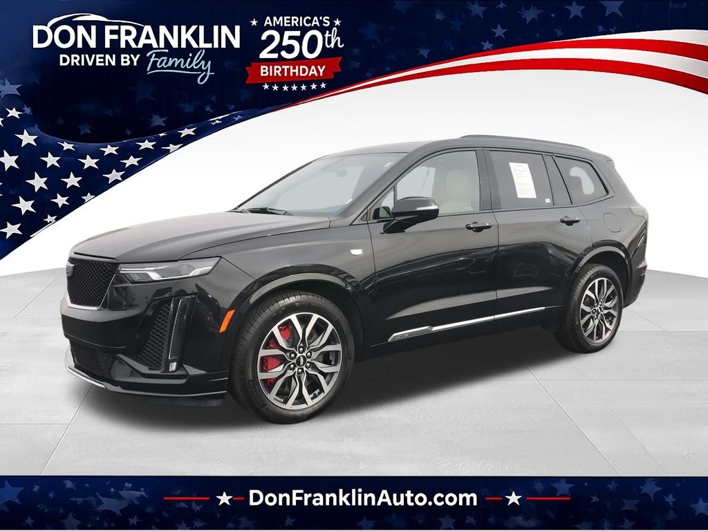 Used 2023 Black Cadillac Sport image 1