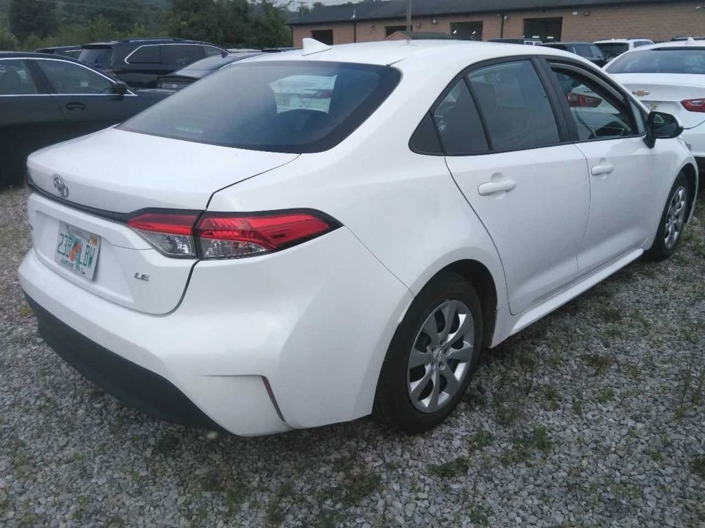 Used 2024 White Toyota LE image 9