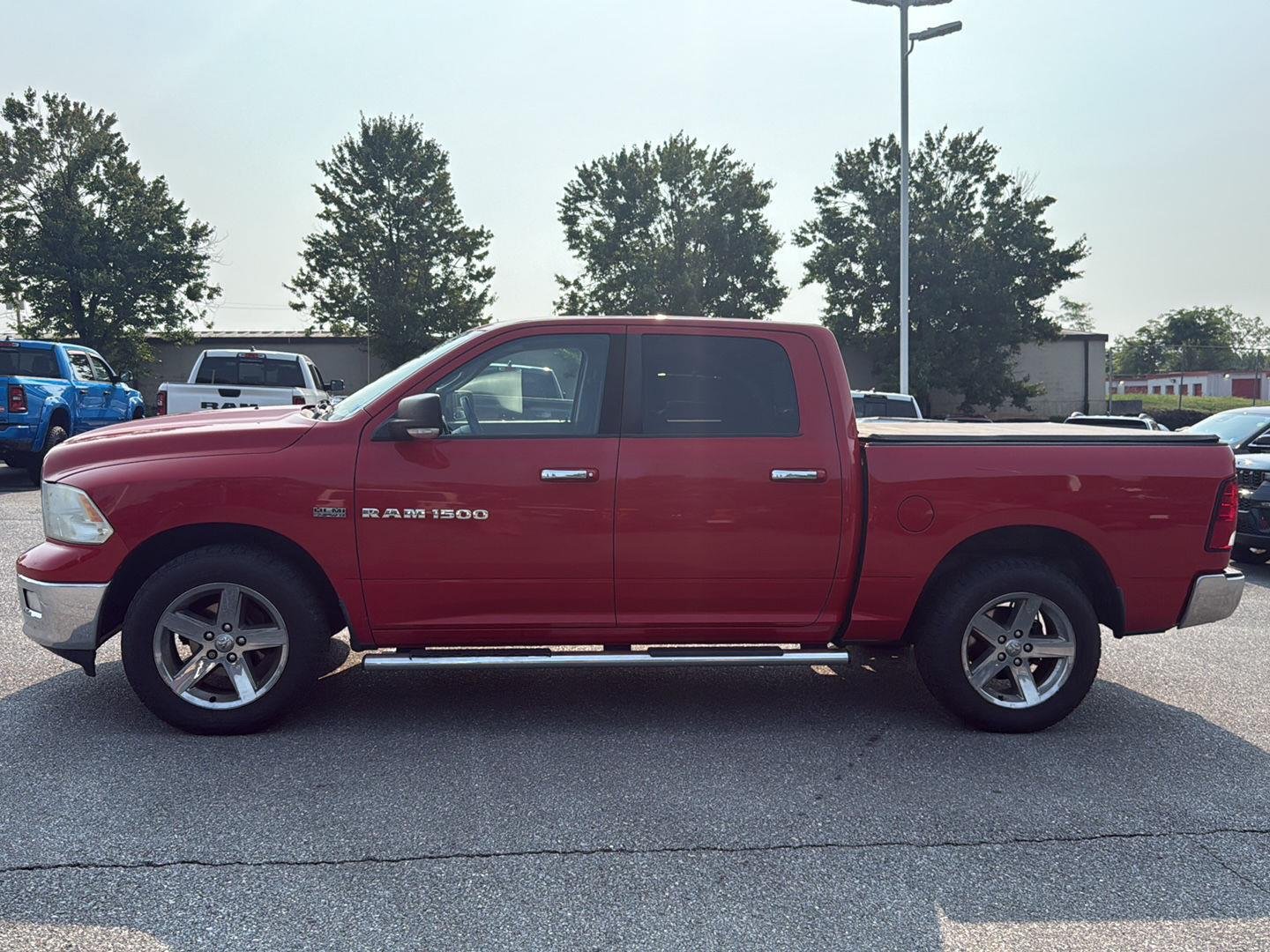 Used 2011 Flame Red Ram Big Horn image 2