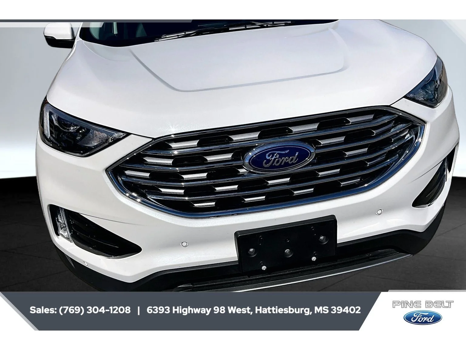 Used 2024 Star White Metallic Tri-Coat Ford Titanium image 22