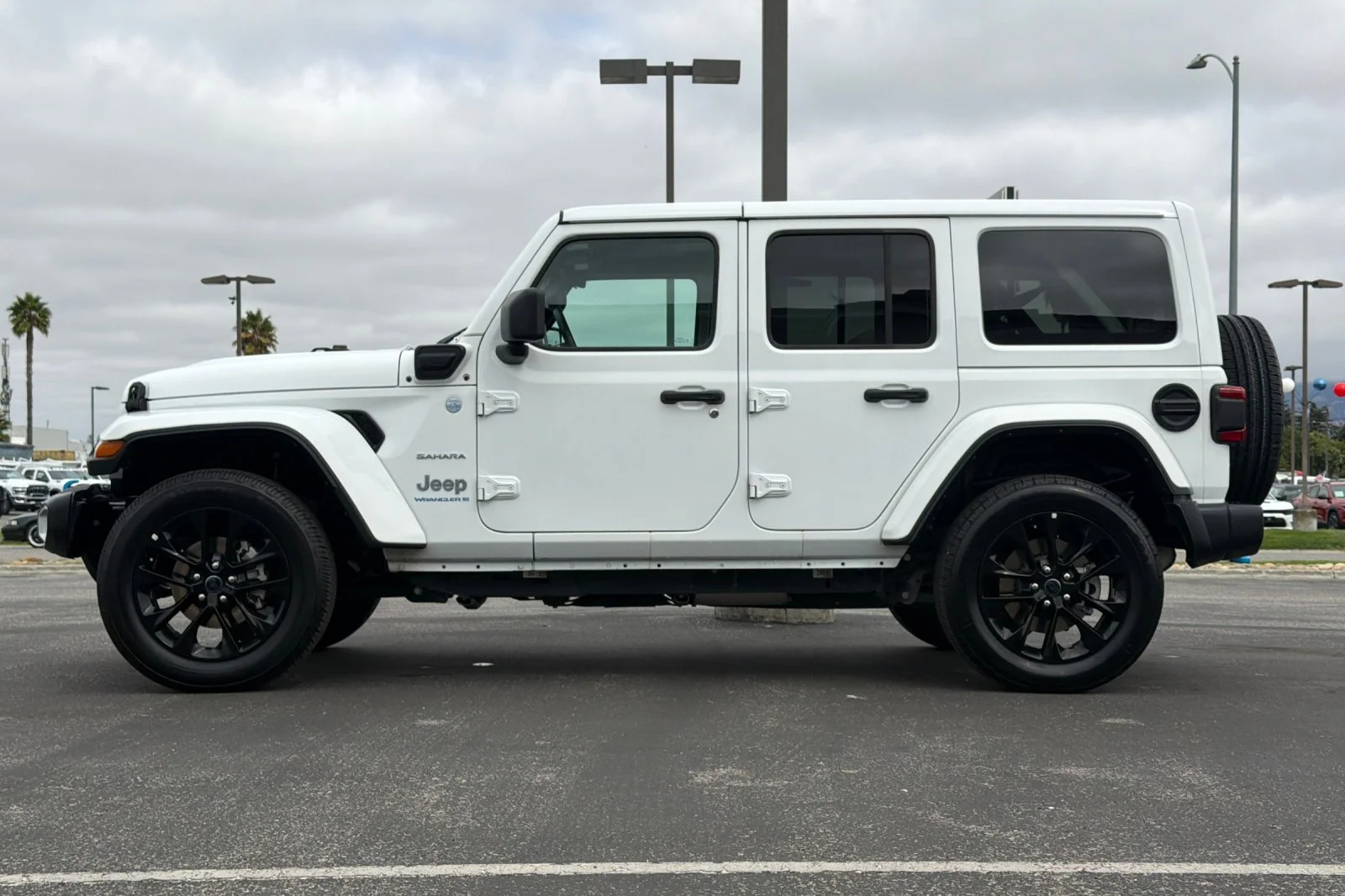 Used 2024 White Jeep Sahara 4xe image 7