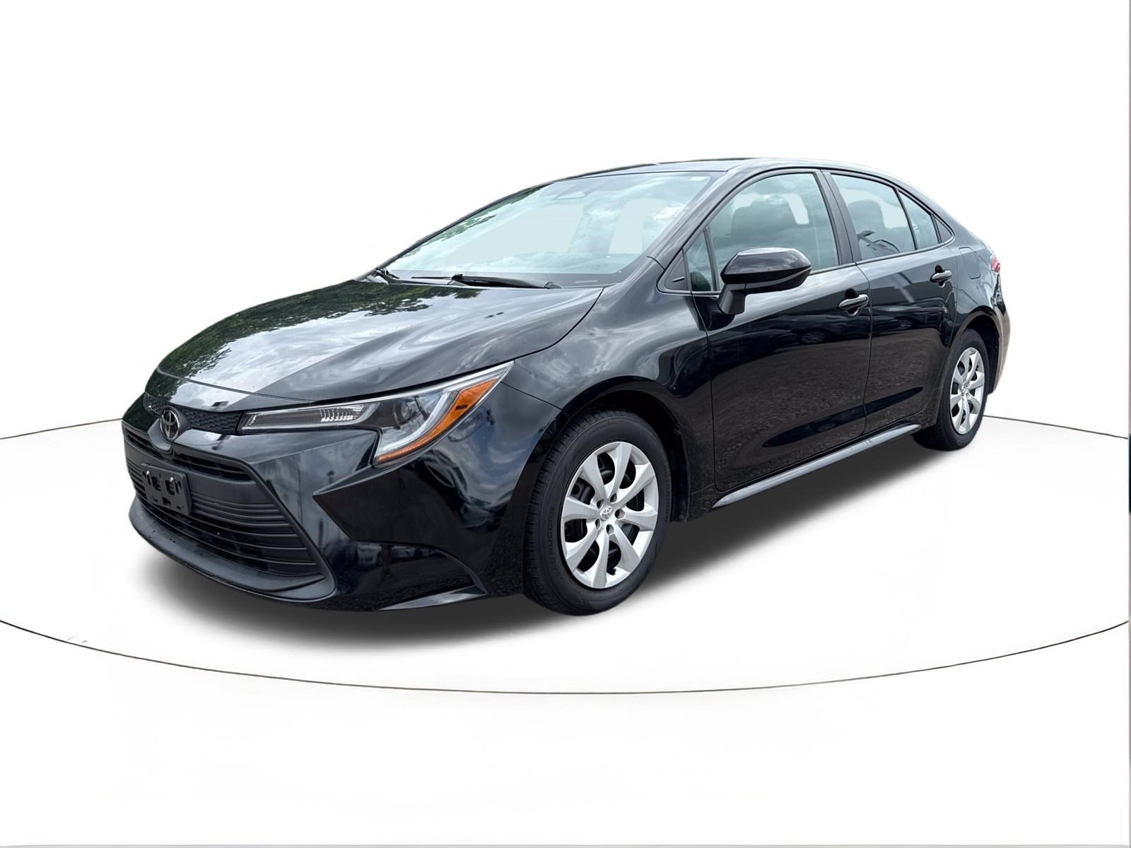 Used 2024 Midnight Black Metallic Toyota LE image 7