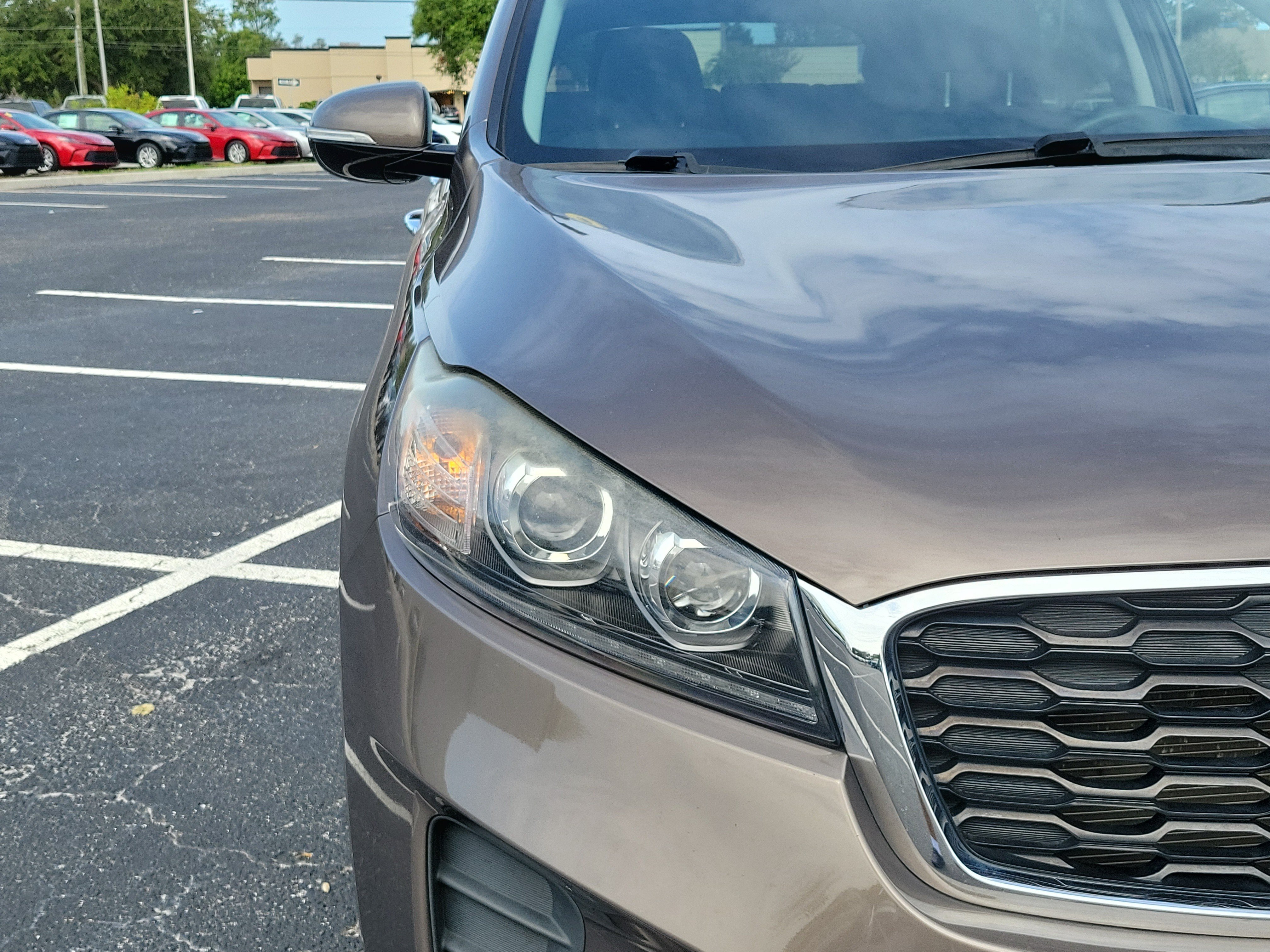 Used 2020 Dragon Brown Kia LX image 6