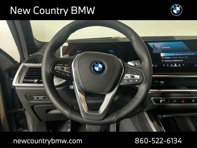 Used 2026 Skyscraper Grey Metallic BMW xDrive50e image 14