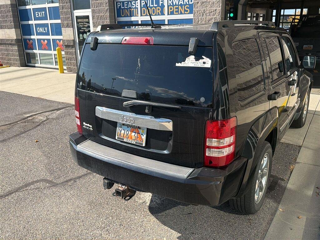 Used 2012 Brilliant Black Crystal Pearl Jeep Sport Latitude image 13