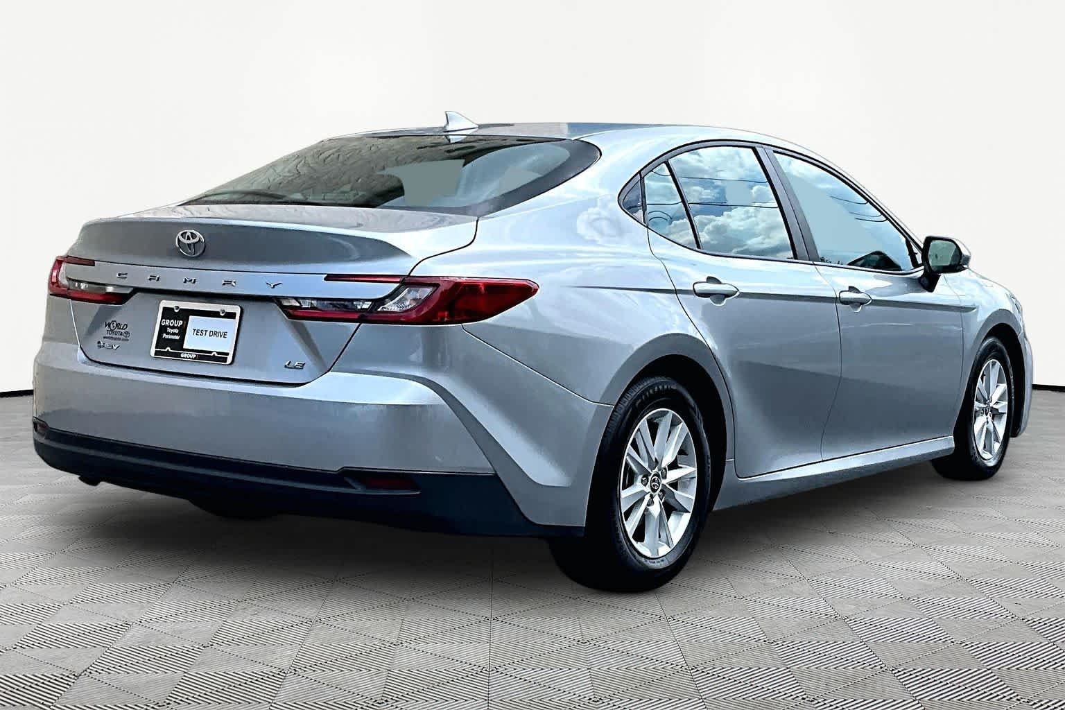 Used 2025 Celestial Silver Metallic Toyota LE image 13