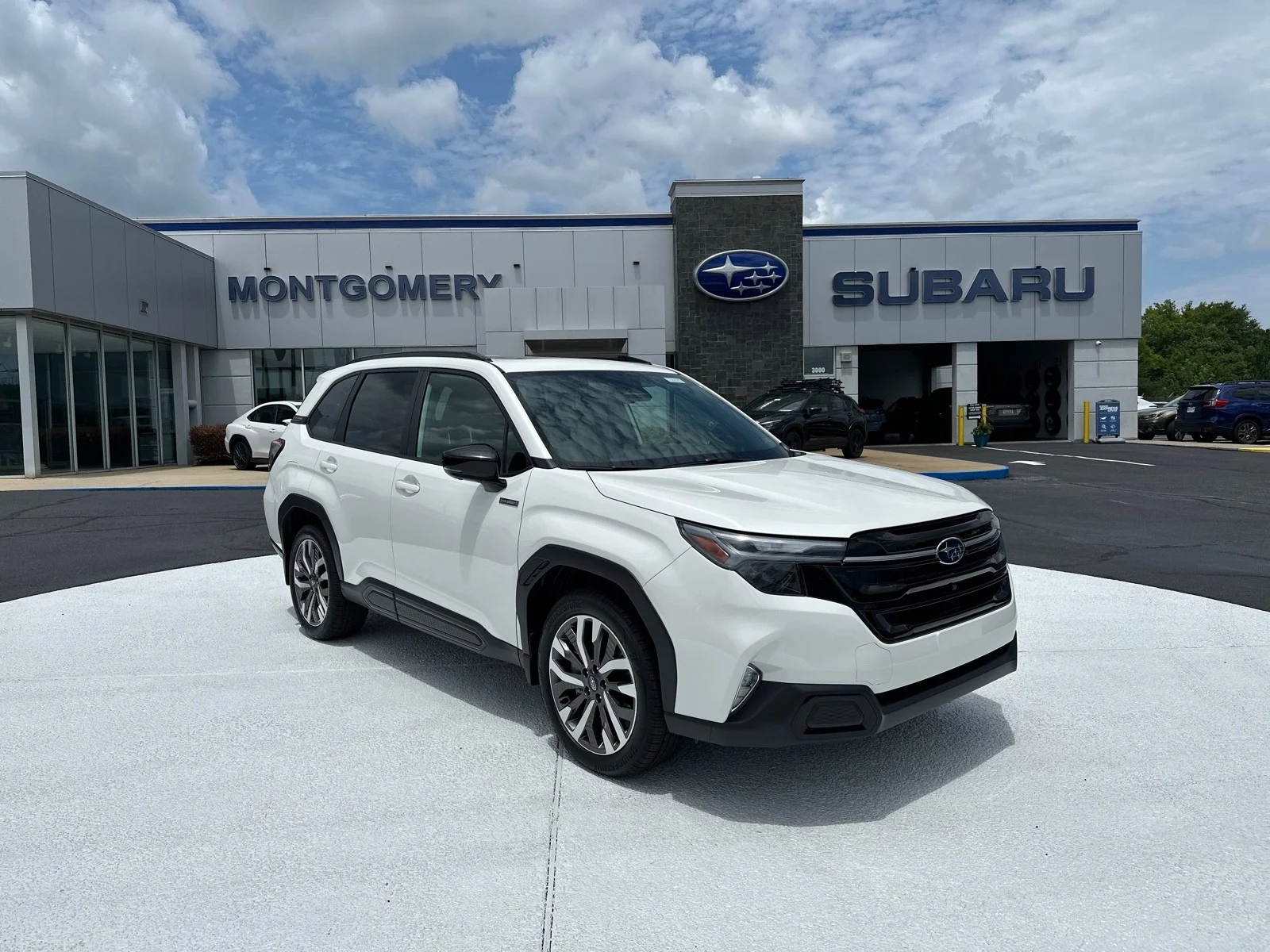 Used 2026 Crystal White Pearl Subaru Touring Hybrid image 1