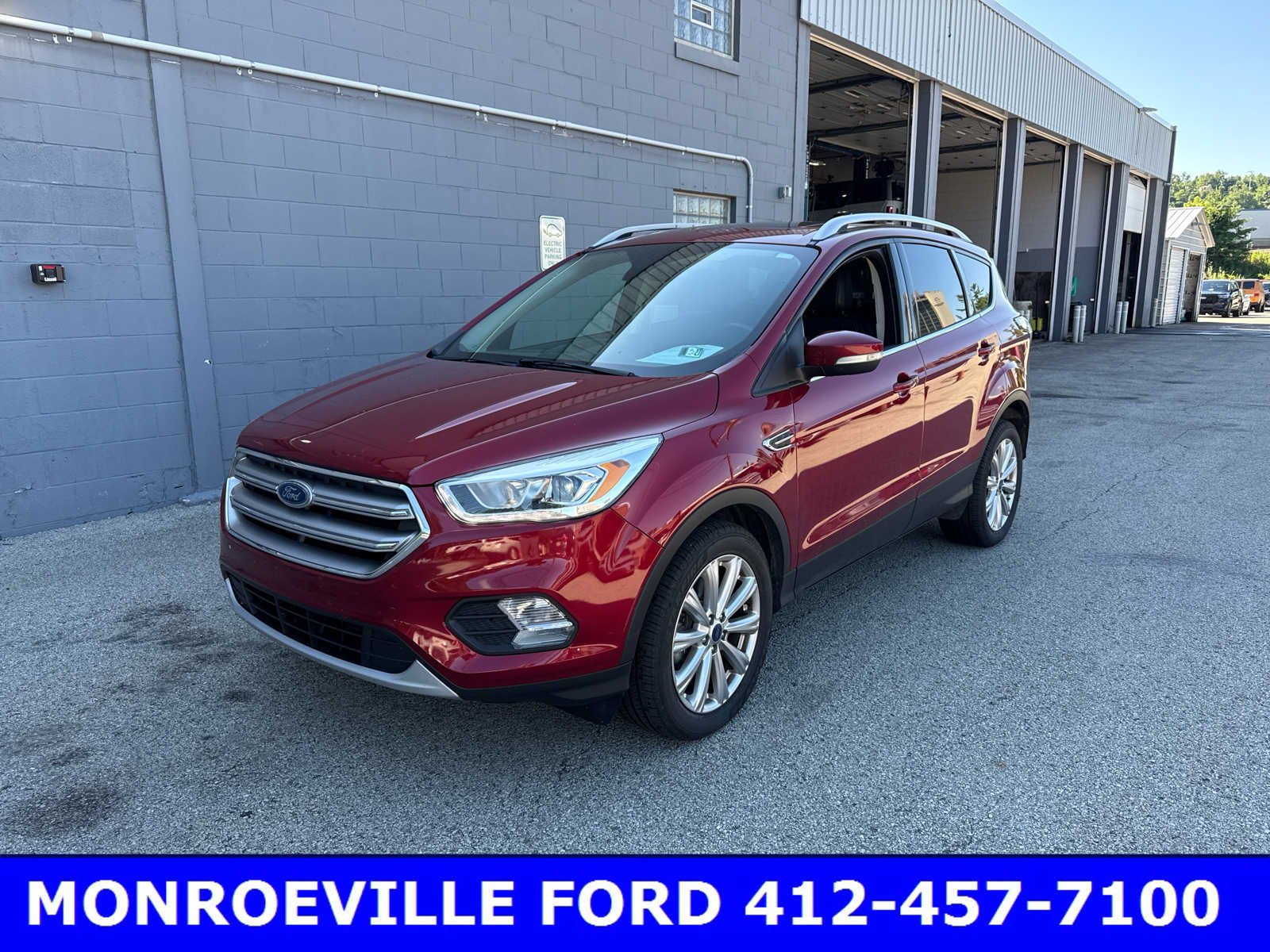 Used 2017 Ruby Red Metallic Tinted Clearcoat Ford Titanium image 1