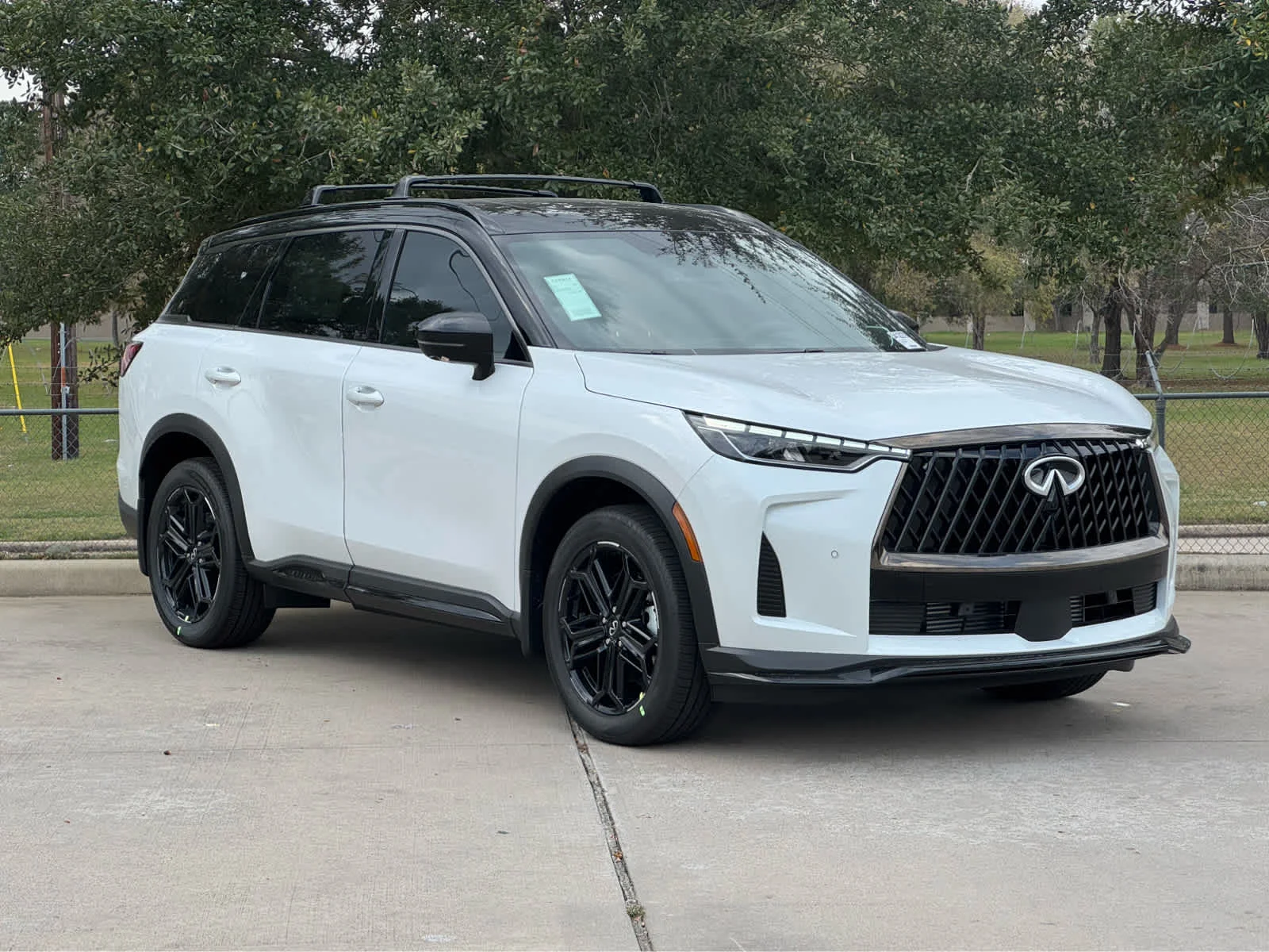 Certified Used 2026 Radiant White/Black Obsidian INFINITI SPORT image 4