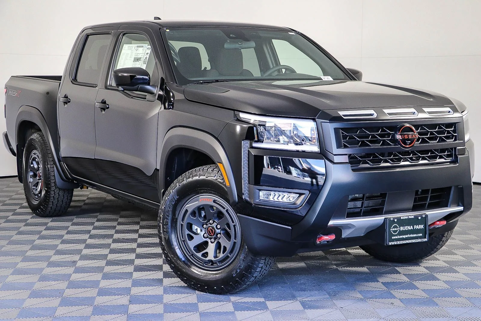 New 2026 Super Black Nissan Crew Cab PRO-X® image 1