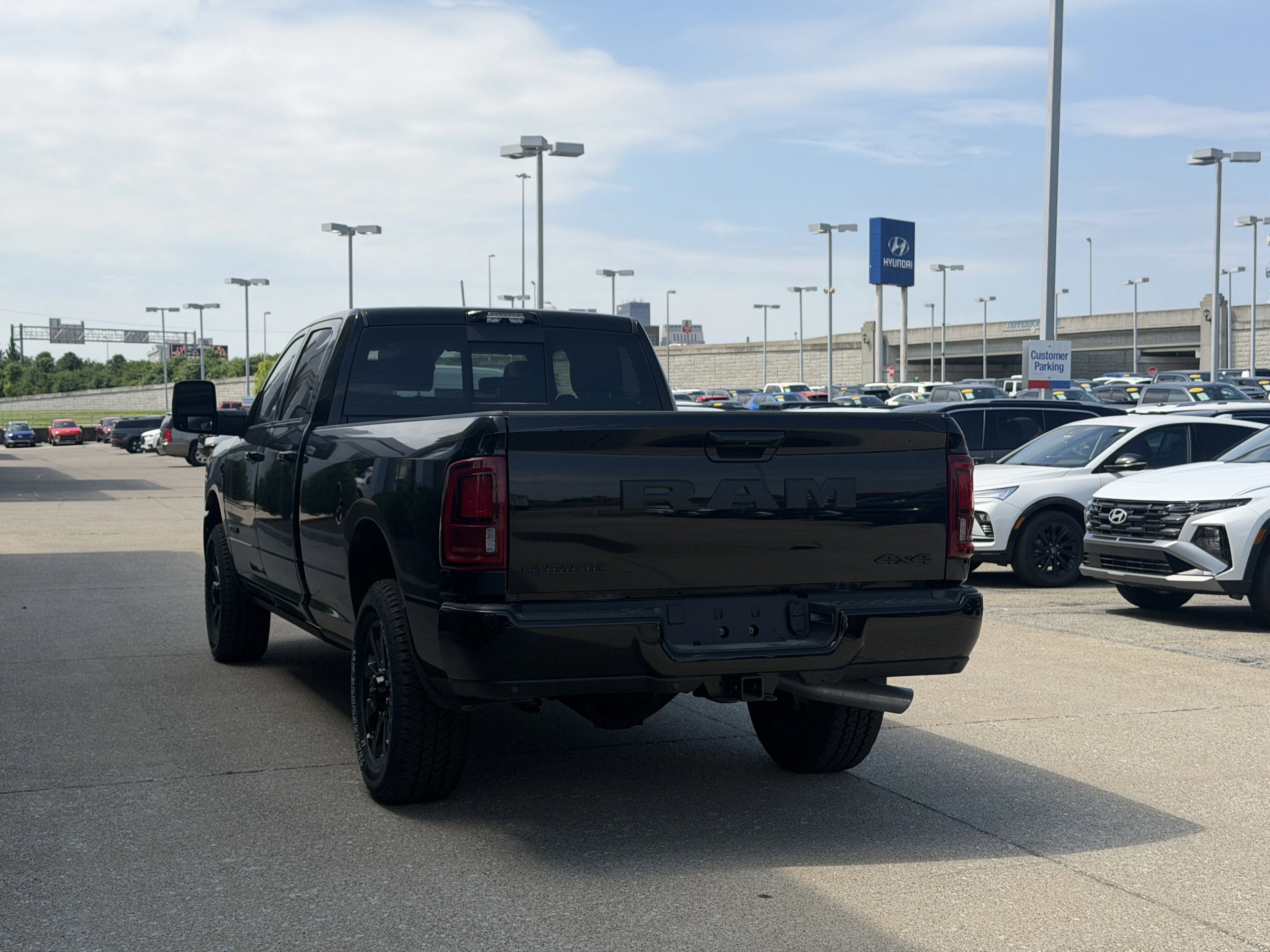 New 2026 Diamond Black Crystal Pearl-Coat Exterior Paint RAM Laramie image 7