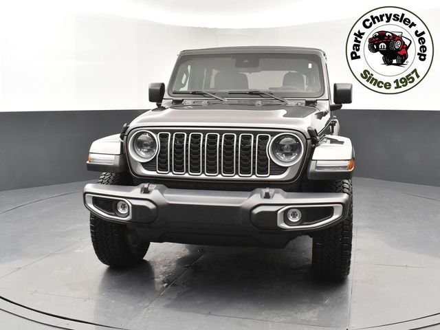 Used 2024 Jeep Wrangler 4-Door Sahara with VIN 1C4PJXEG4RW335475 for sale in Burnsville, Minnesota