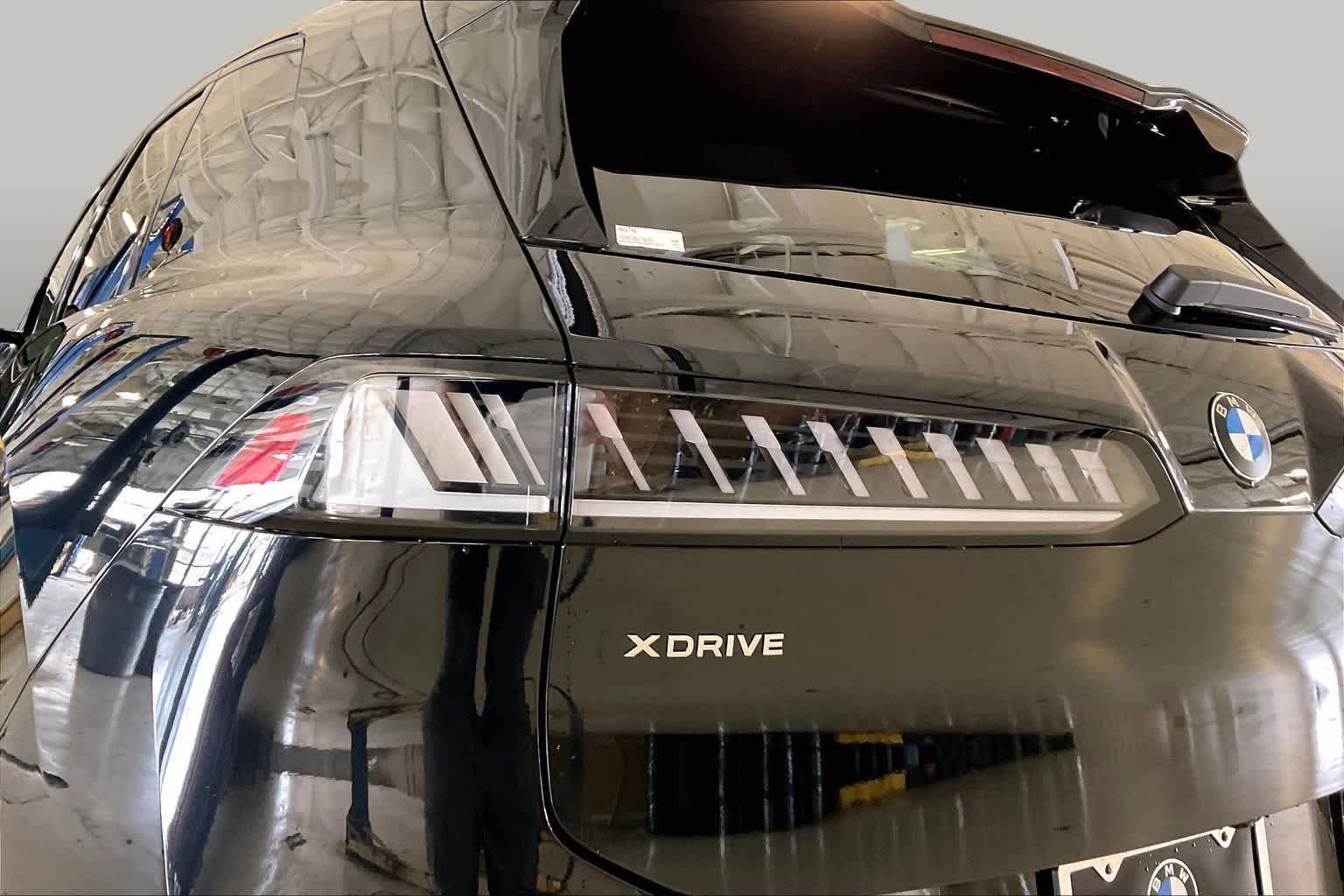 New 2027 Black Sapphire Metallic BMW 50 xDrive image 14