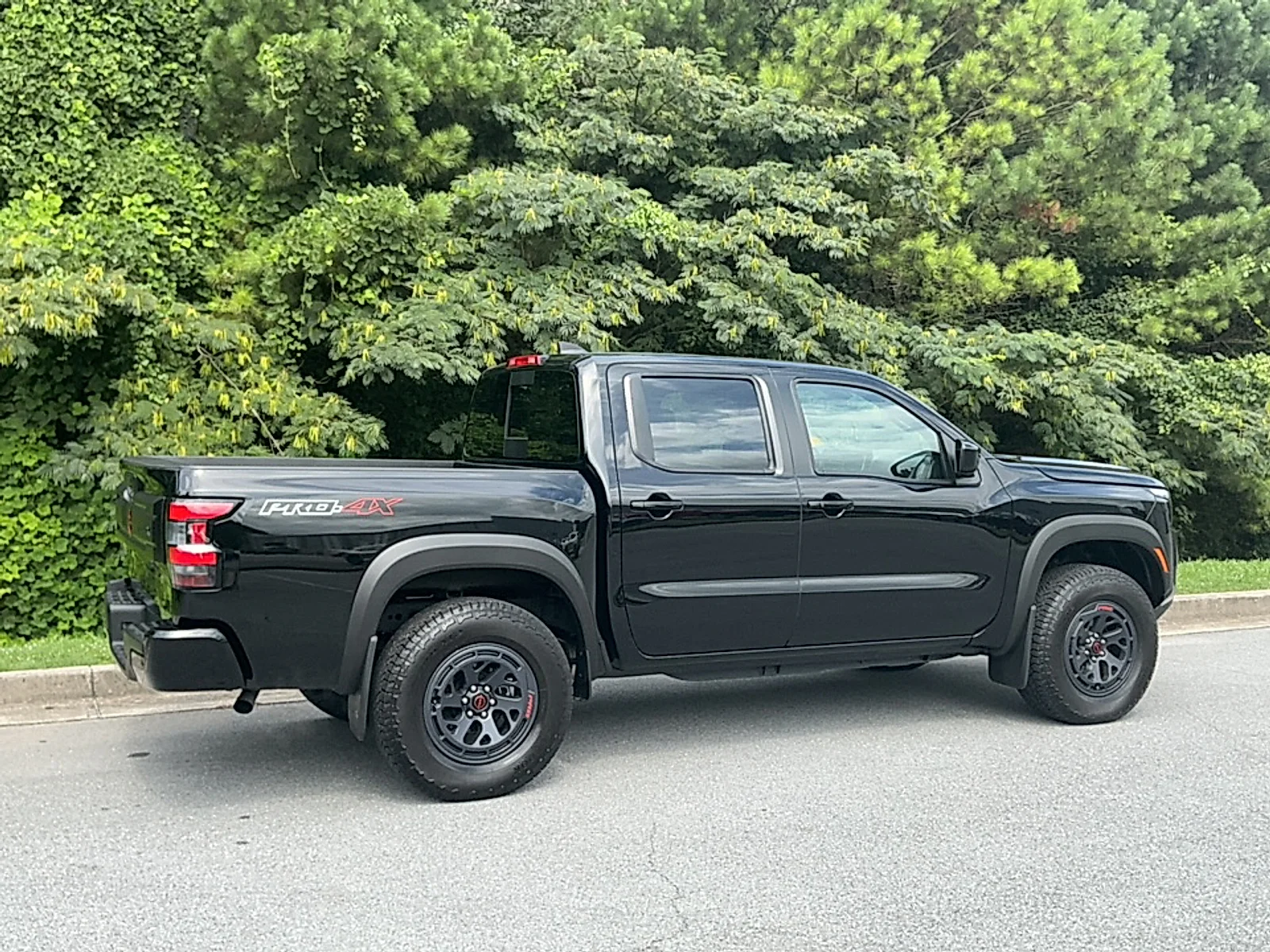 Used 2025 Super Black Nissan Crew Cab PRO-4X 4x4 image 2