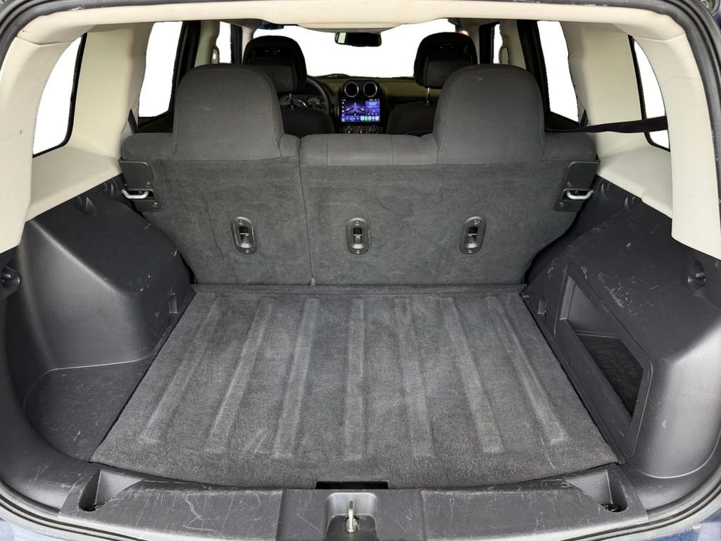 Used 2016 Blue Jeep Sport image 13