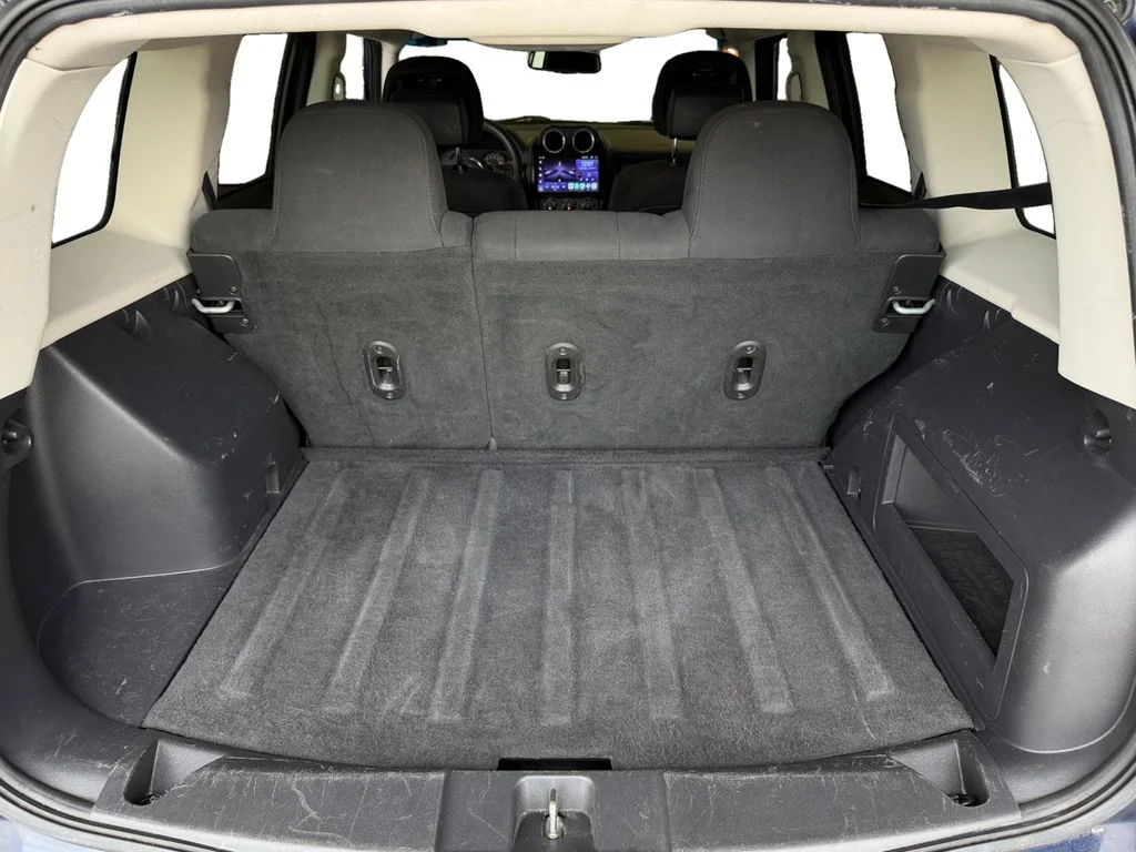 Used 2016 Blue Jeep Sport image 13