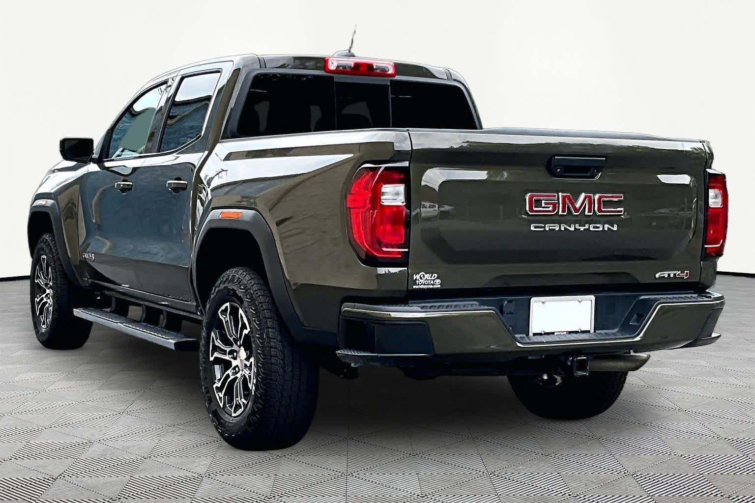 Used 2023 Deep Bronze Metallic GMC 4WD AT4 image 12