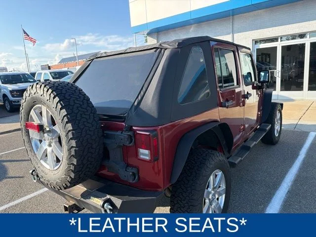 Used 2013 Red Jeep Unlimited Sahara image 5