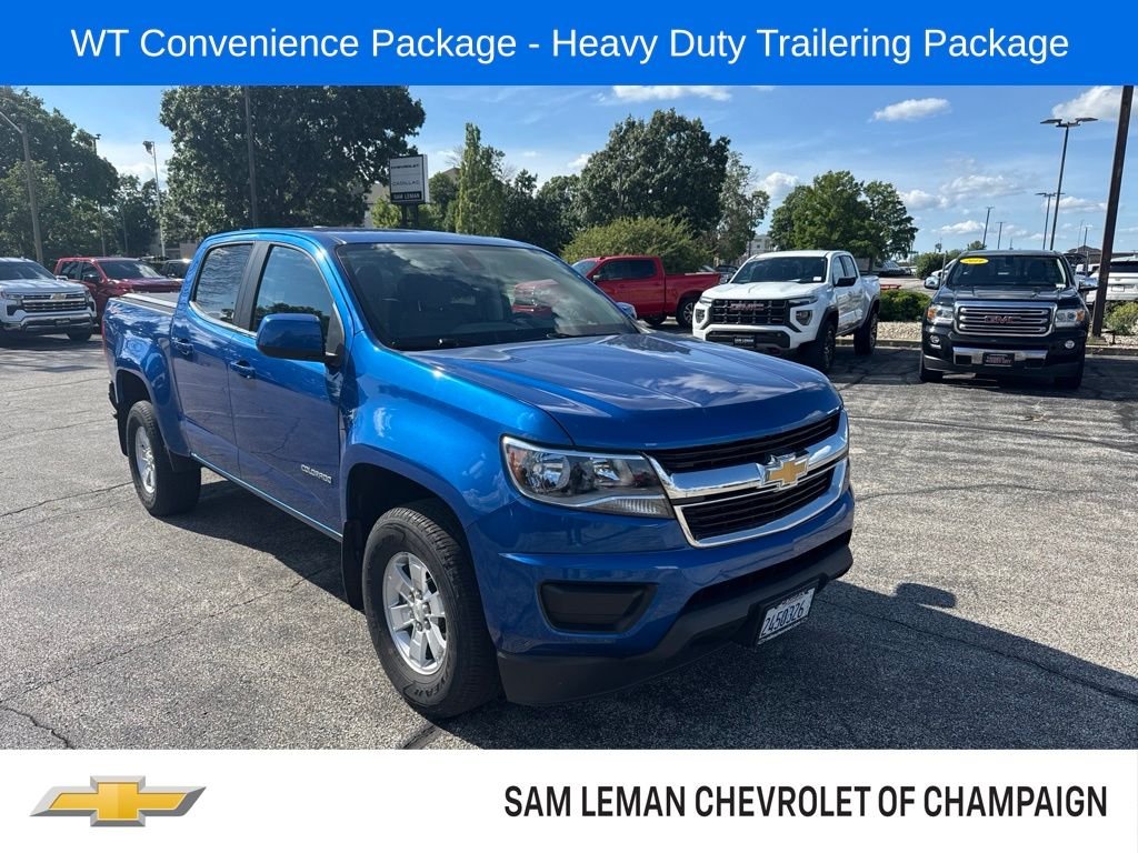 Used 2019 KINETIC BLUE METALLIC Chevrolet 4WD Work Truck image 1