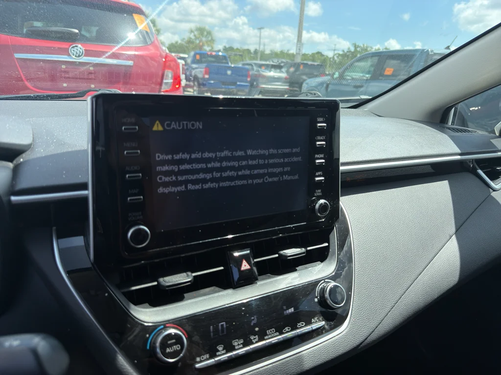 Used 2020 Super White Toyota LE image 7