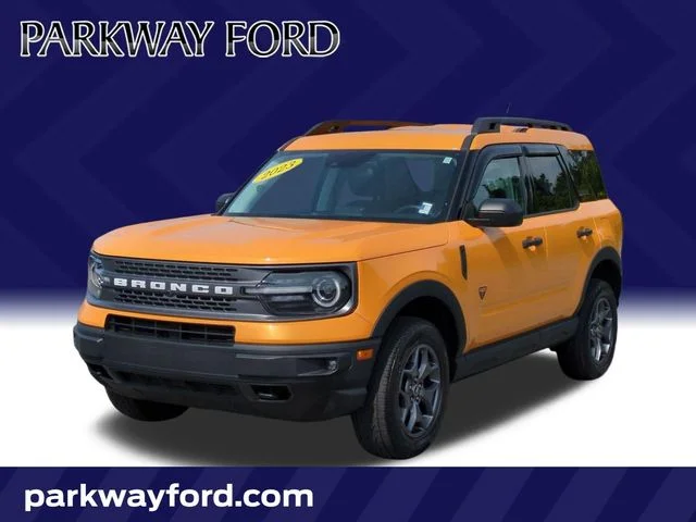 Used 2023 Orange Ford Badlands image 1