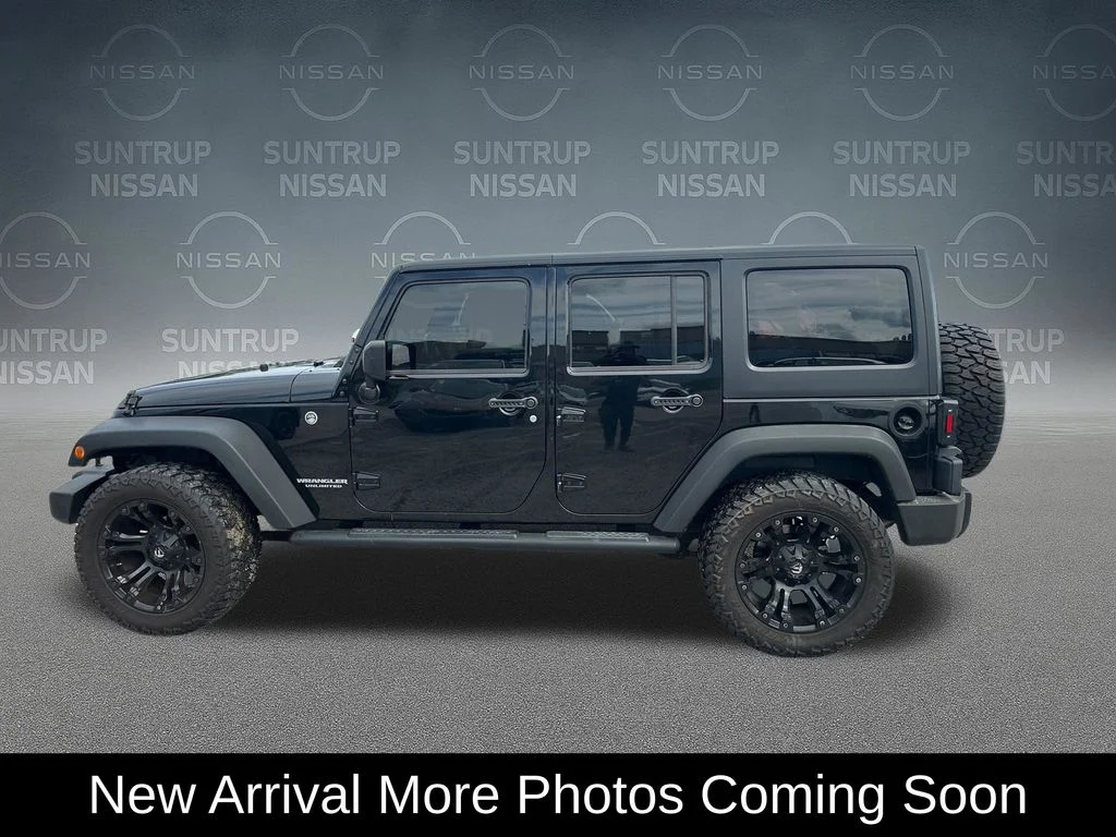 Used 2016 Black Jeep Unlimited Sport image 2
