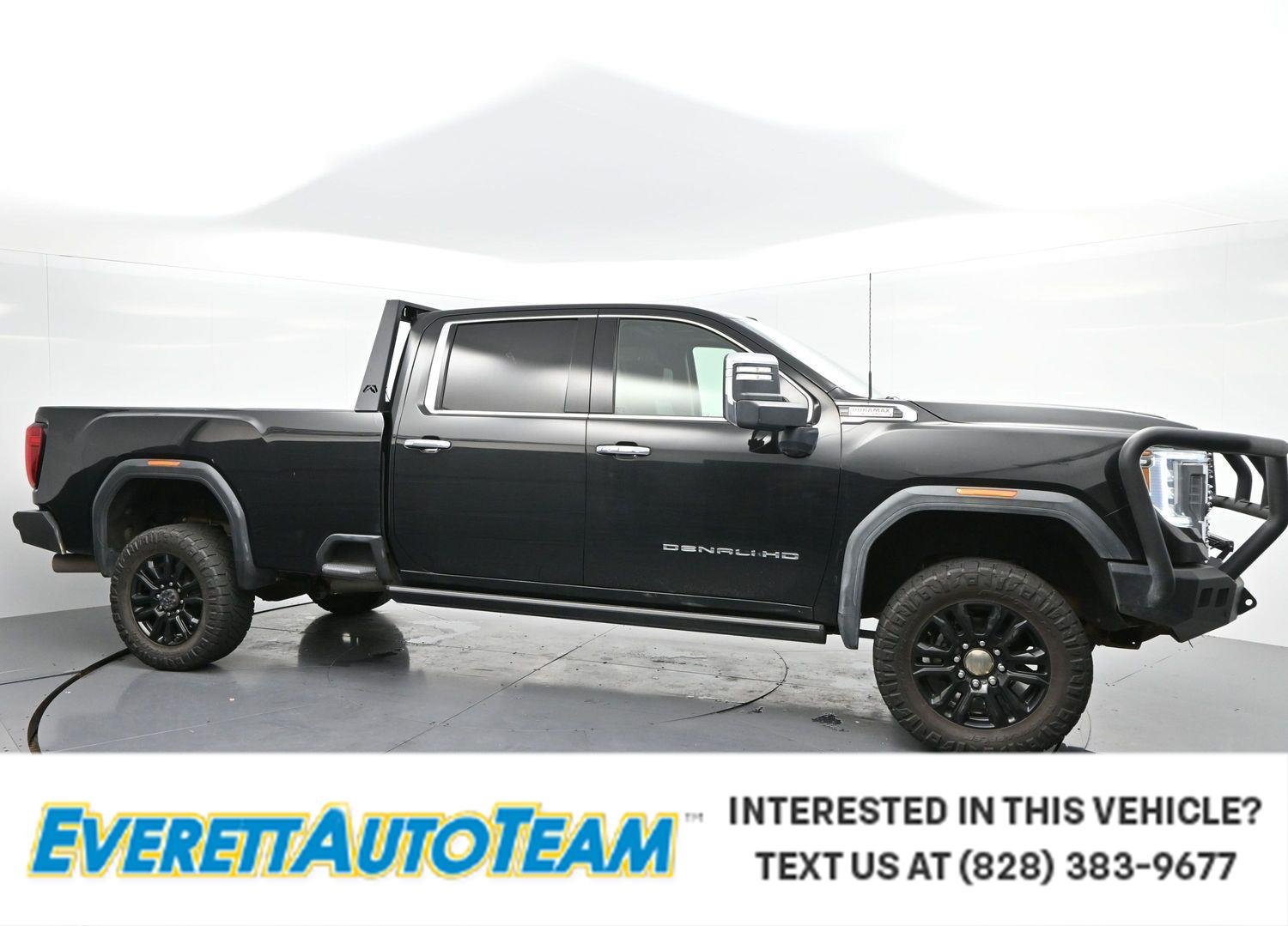 Used 2021 Ebony Twilight Metallic GMC Denali image 1