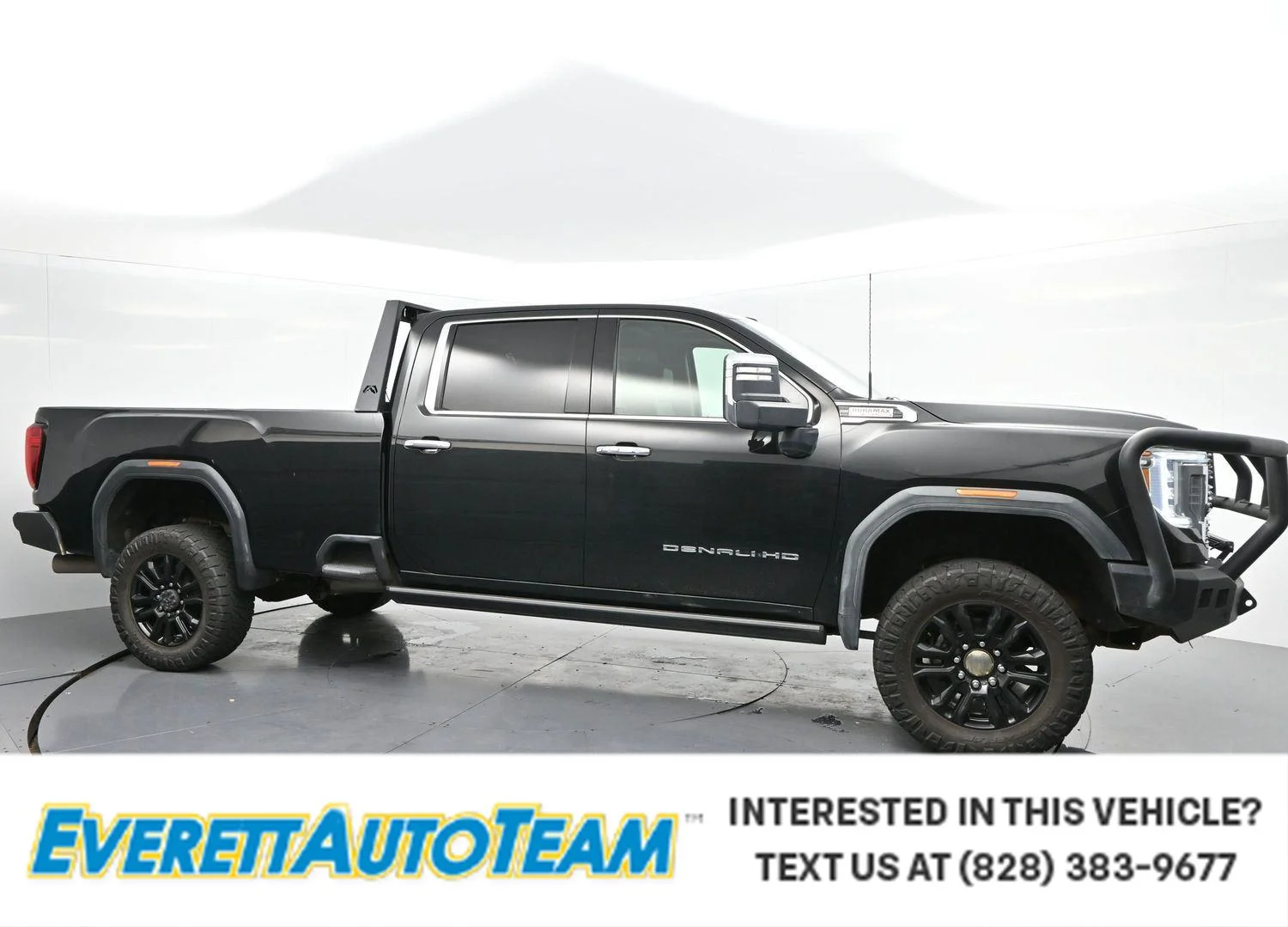 Used 2021 Ebony Twilight Metallic GMC Denali image 1