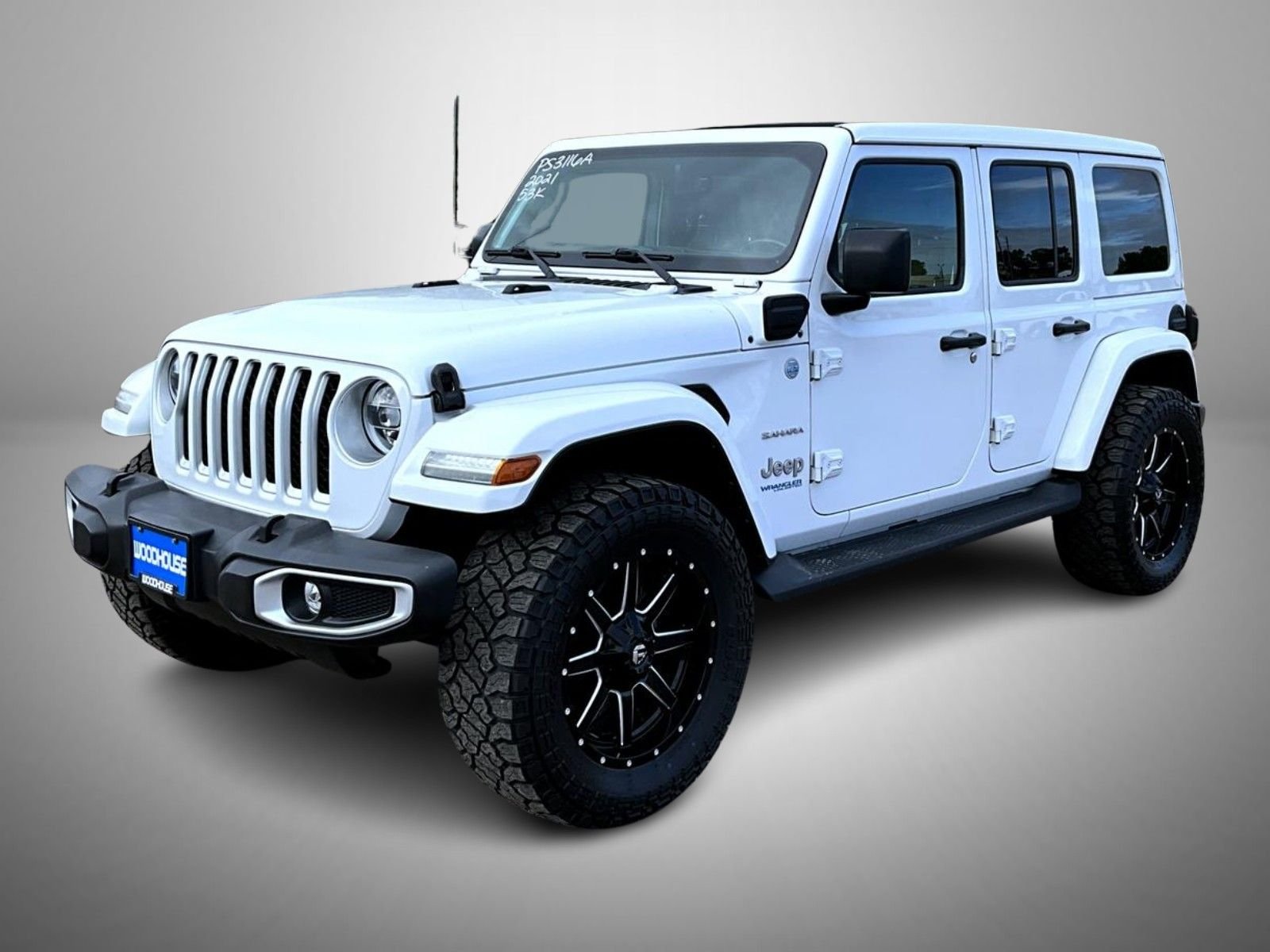 Used 2021 White Jeep Unlimited Sahara 4xe image 1