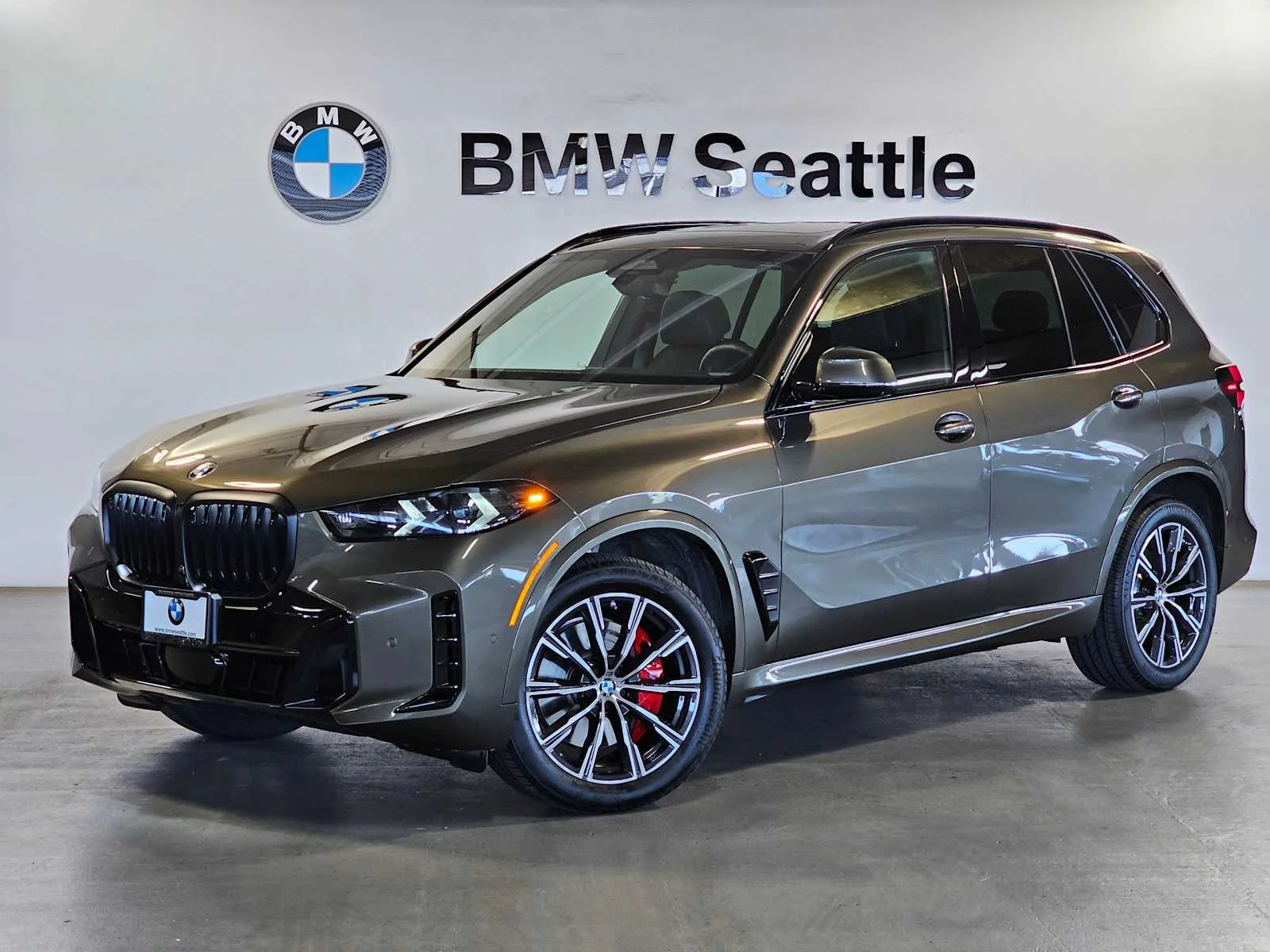 Certified Used 2026 Manhattan Green Metallic BMW xDrive40i image 1