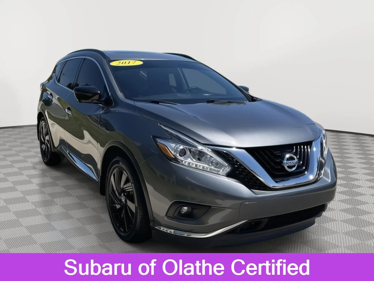 Used 2017 Gun Metallic Nissan Platinum image 1