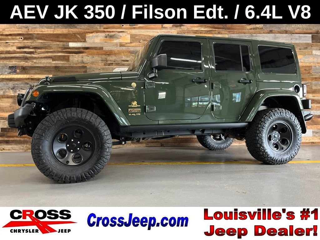 Used 2014 Black Clearcoat Jeep Unlimited Rubicon image 1