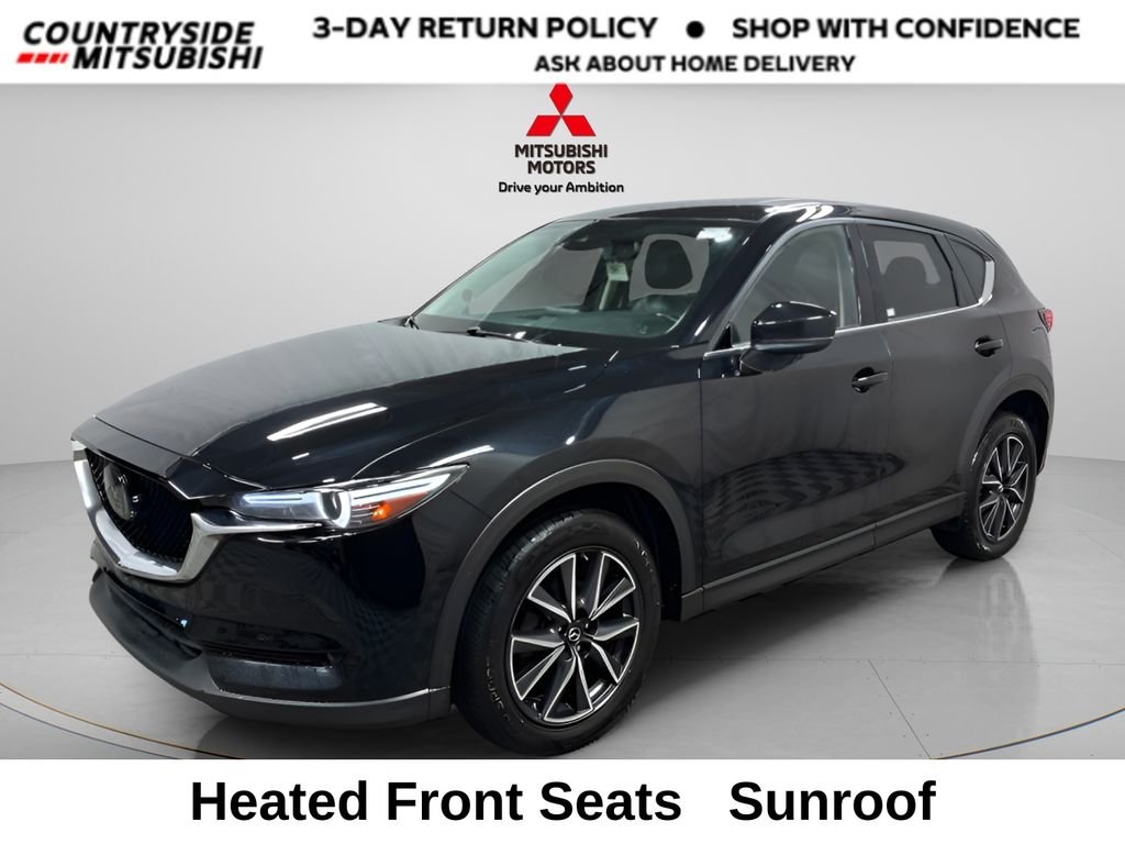 Used 2018 Jet Black Mazda Grand Touring image 1