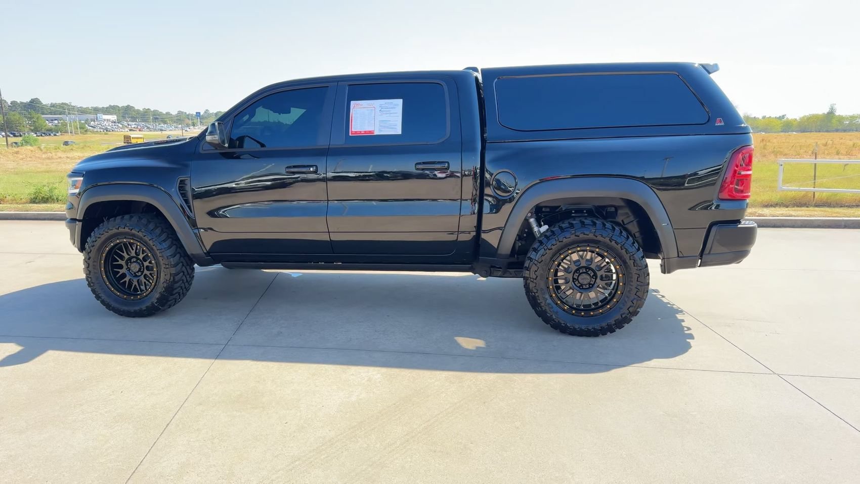 Used 2025 Diamond Black Crystal Pearlcoat Ram RHO image 6