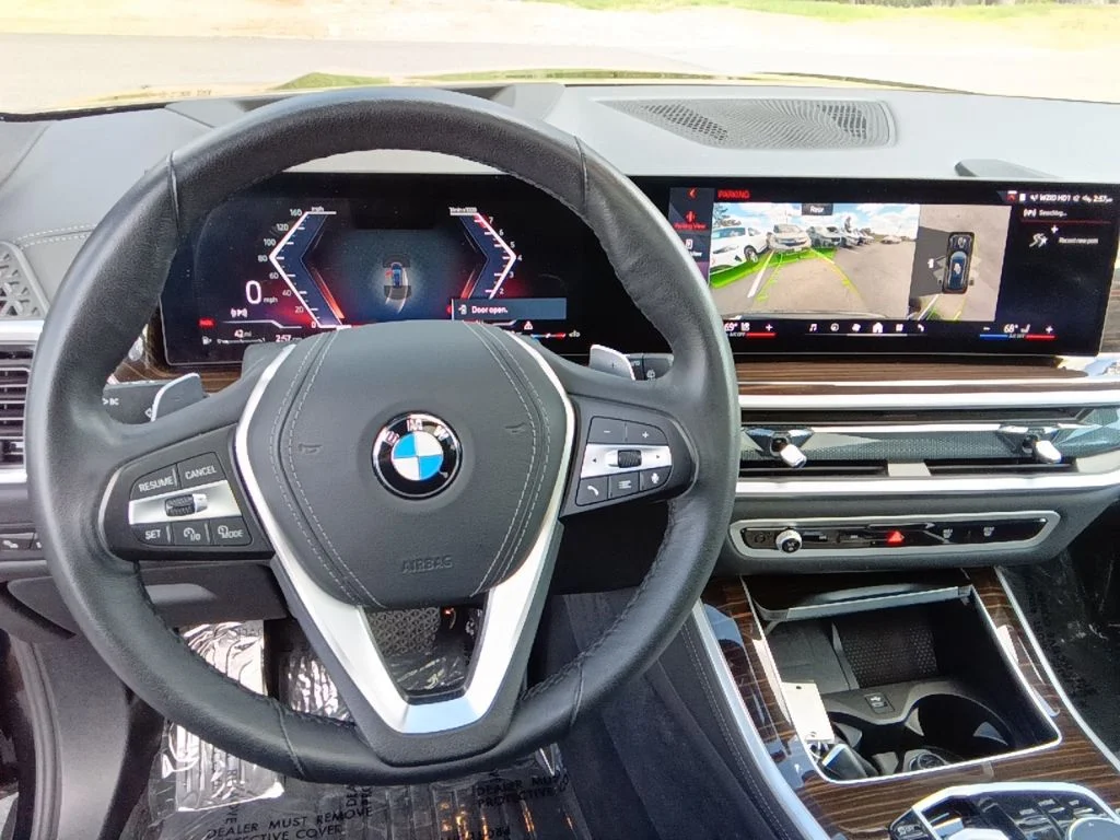 Certified Used 2025 Black Sapphire Metallic BMW xDrive40i image 13