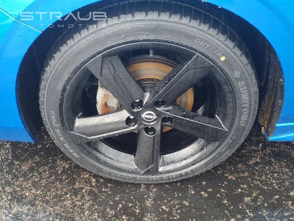 Used 2025 Electric Blue Metallic/Super Black Nissan SR image 11
