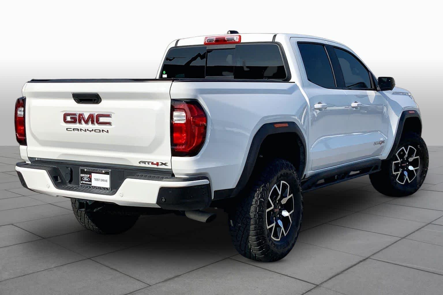 Used 2024 Summit White GMC 4WD AT4X image 12