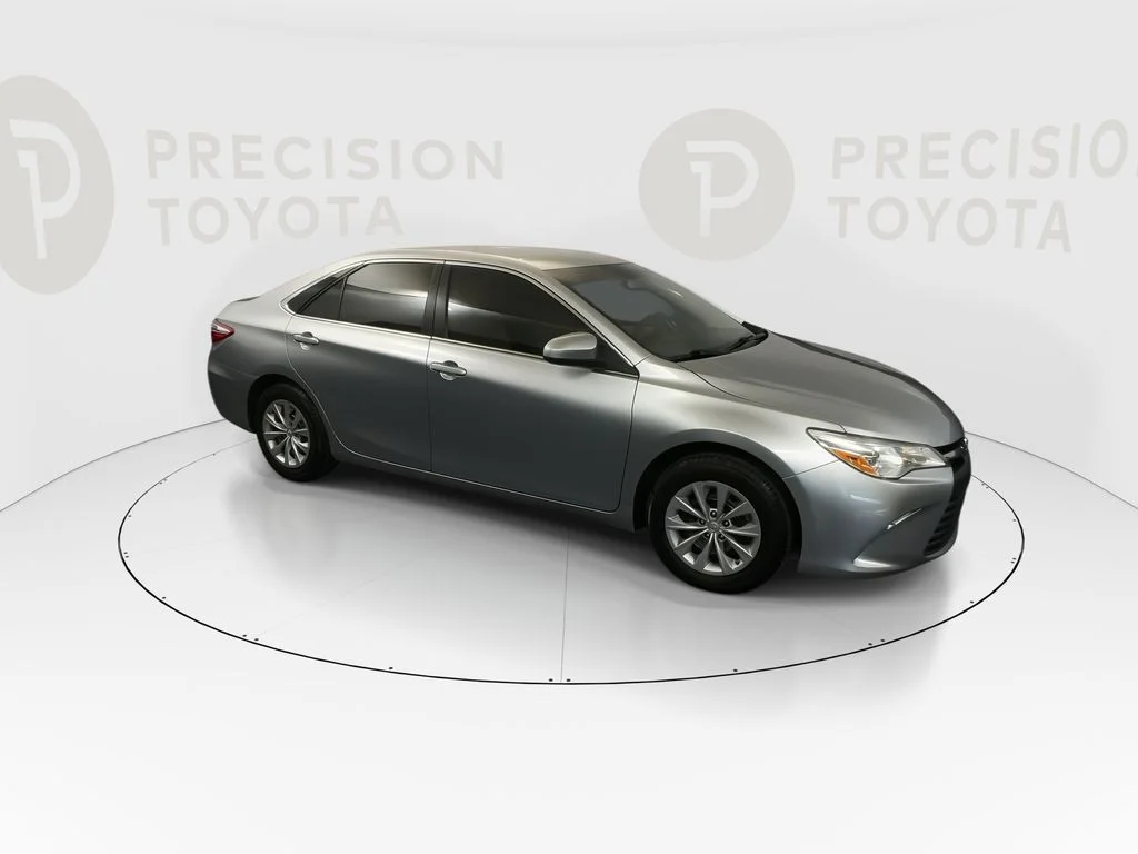 Used 2016 Celestial Silver Metallic Toyota LE image 2