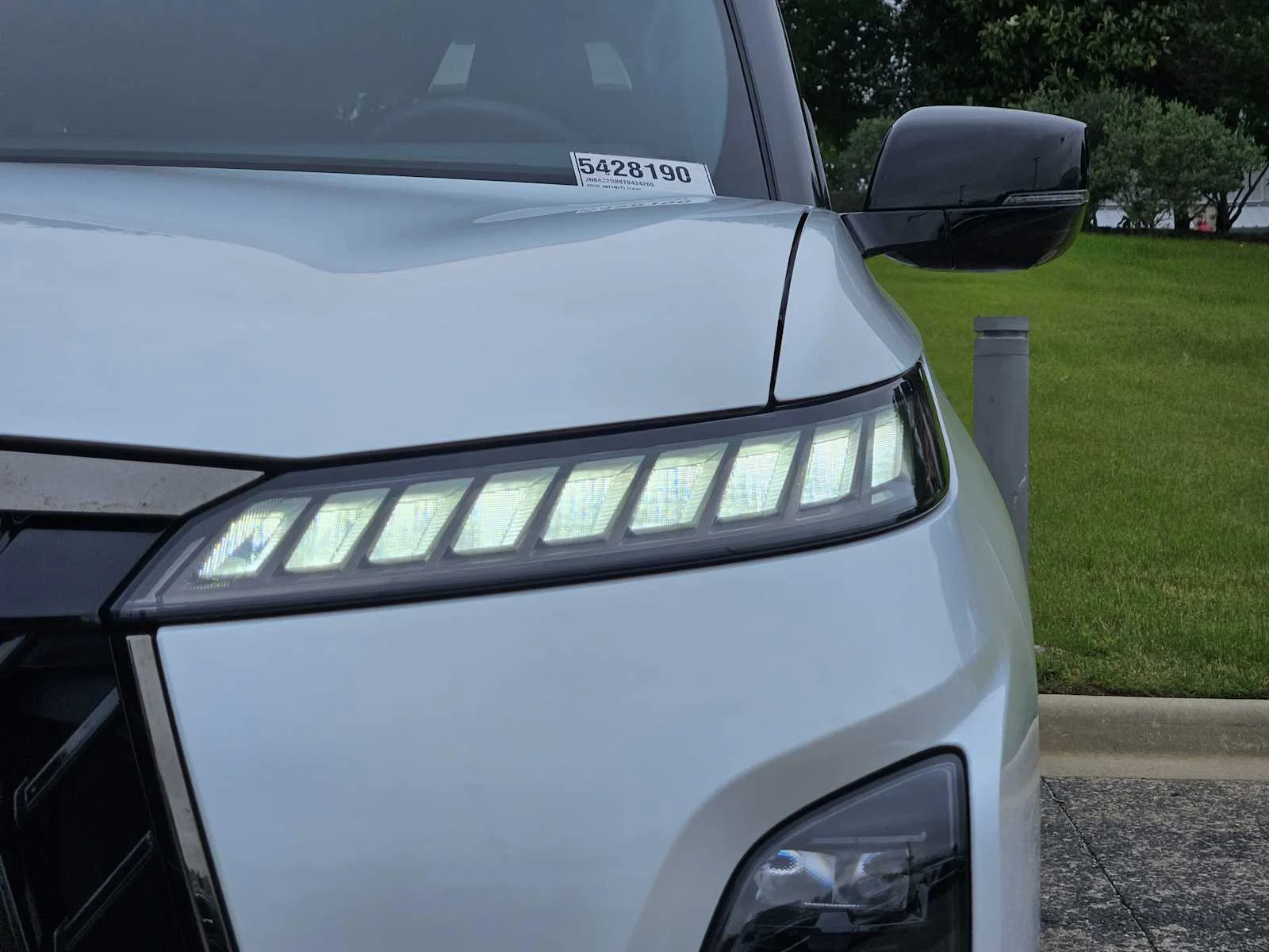 New 2026 RADIANT WHITE INFINITI Sport 4WD image 6