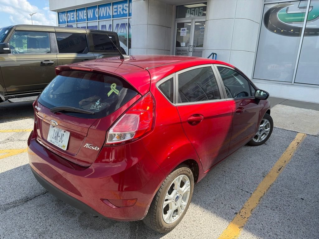 Used 2014 Ruby Red Metallic Ford SE image 4