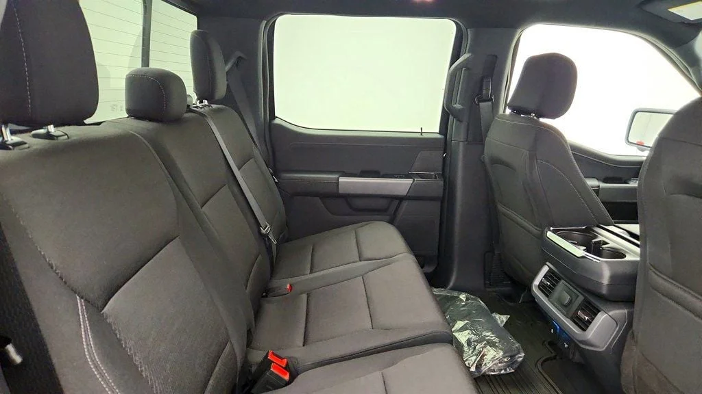 Used 2025 Agate Black Metallic Ford XLT 4WD SuperCrew 5.5