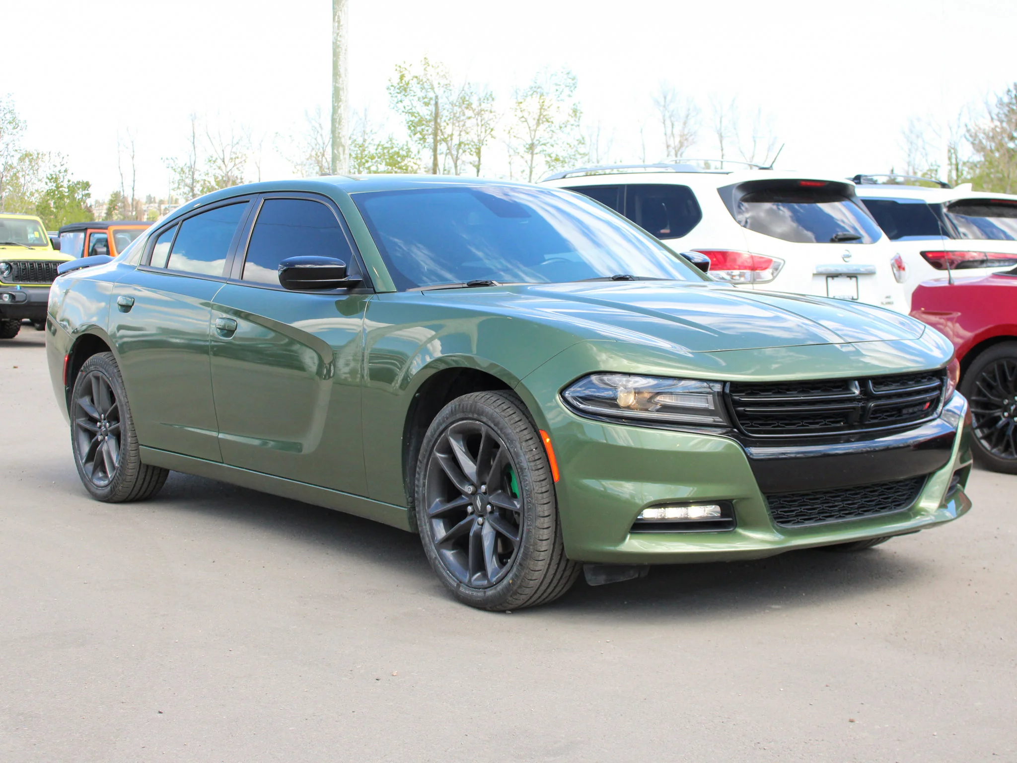 Certified Used 2021 Green Dodge SXT * 300HP V6 | Blacktop Package | Heated Seats | Navigation | F8 Green Metallic image 8