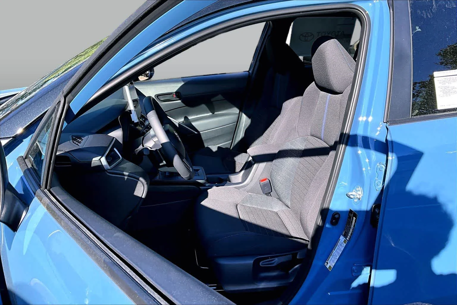 New 2026 Cavalry Blue/Jet Black Toyota Hybrid SE image 9