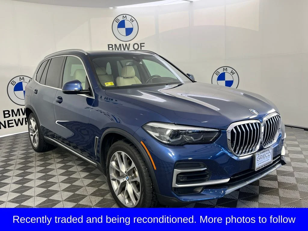 Used 2022 Blue BMW xDrive40i image 1