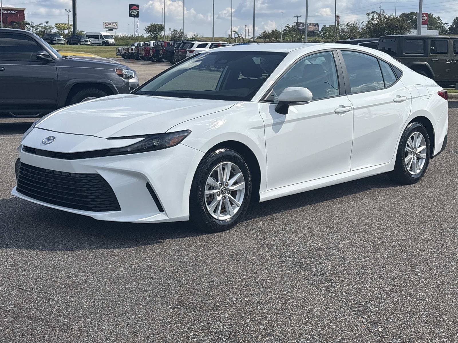 Used 2025 White Toyota LE image 1