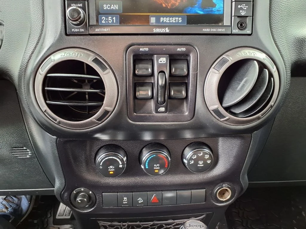 Used 2016 Blue Jeep Unlimited Sport image 9