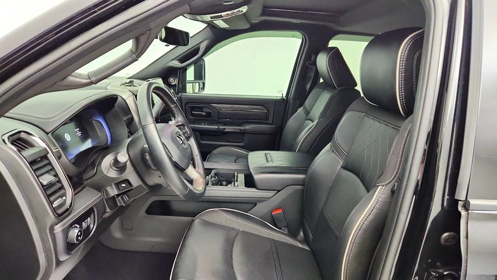 Used 2025 Black Clearcoat Ram Limited 4x4 Crew Cab 6