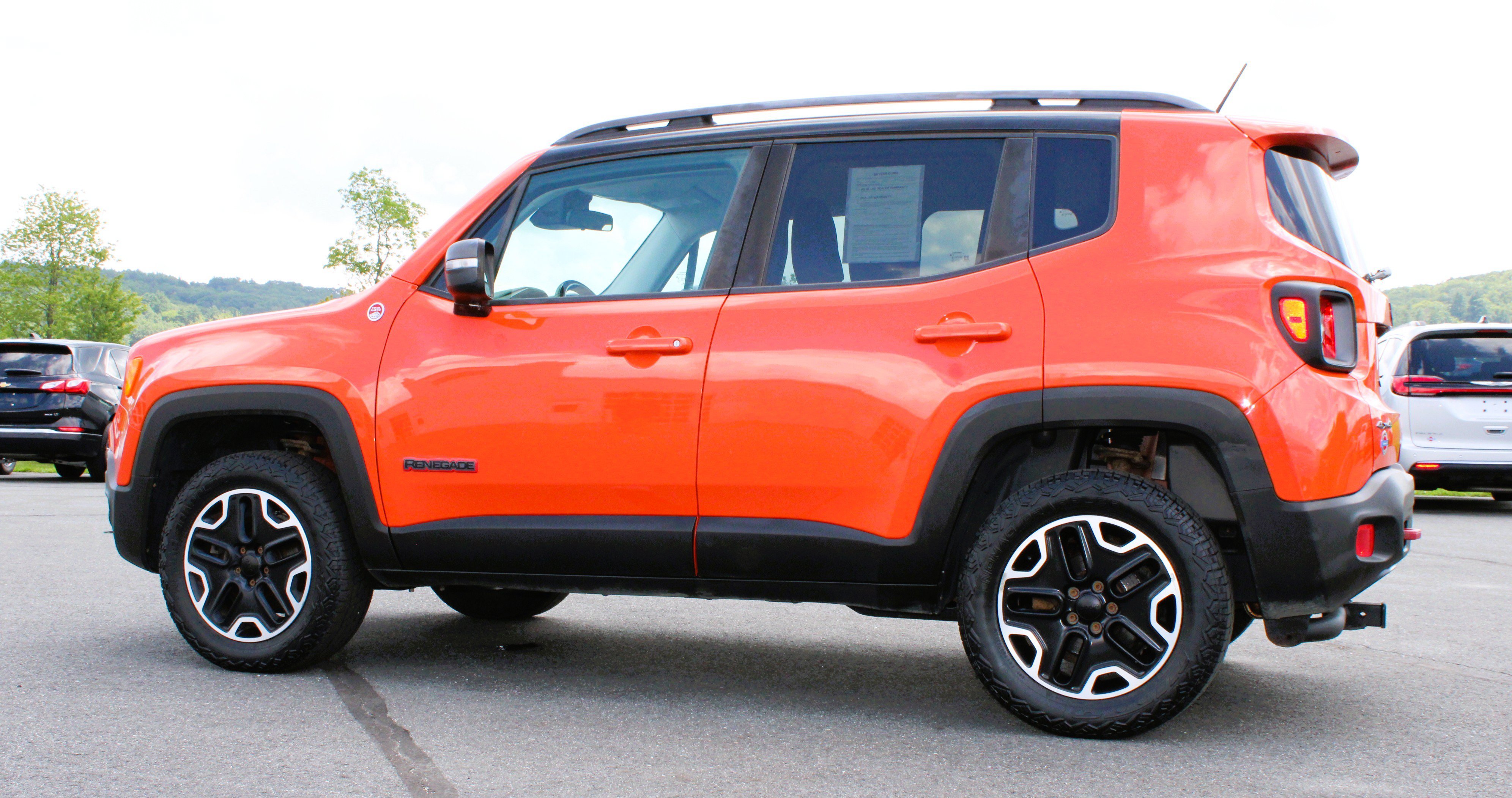 Used 2015 Omaha Orange Jeep Trailhawk image 6