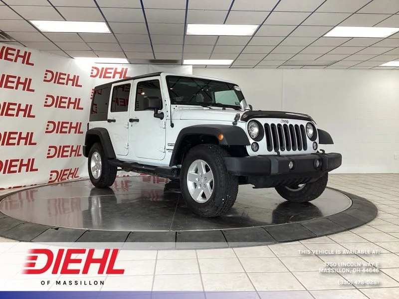 Used 2014 White Jeep Unlimited Sport image 1