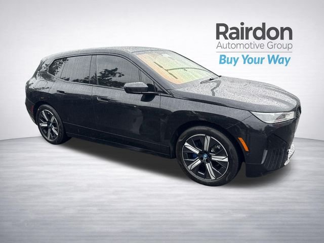 Used 2022 Black BMW xDrive50 image 1